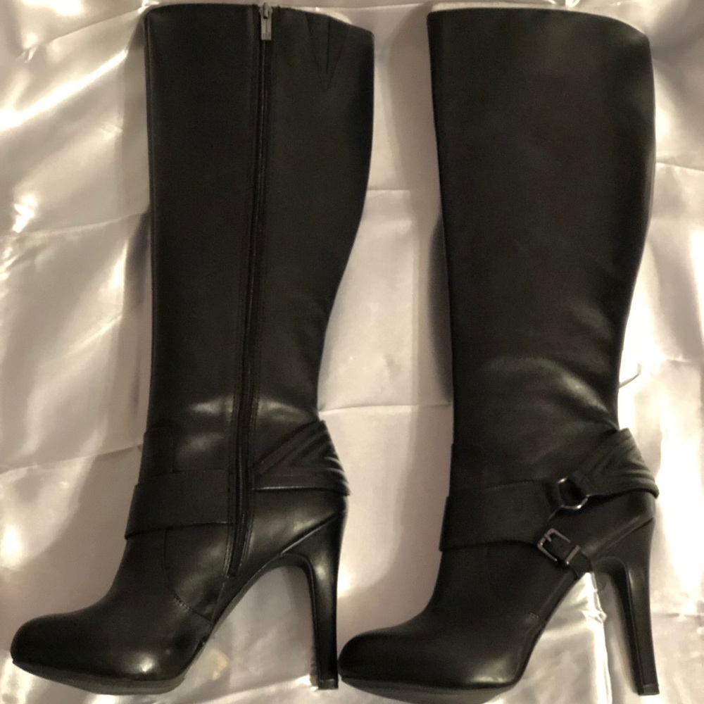 Knee high heeled boots